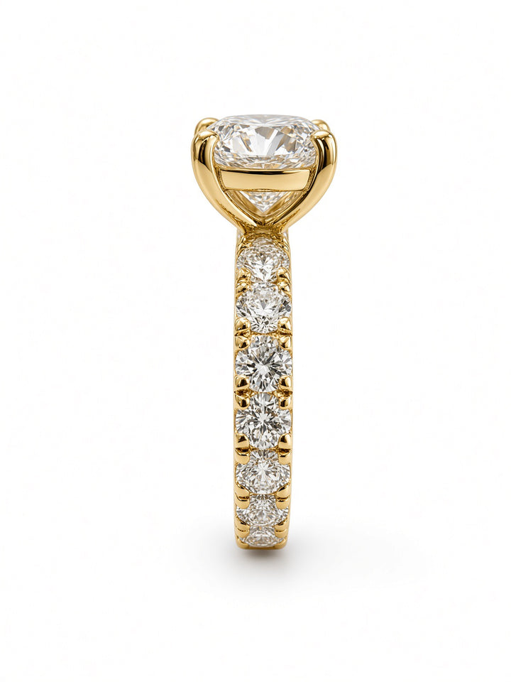 14K Yellow Gold Engagement 2.70CT Round Cut Lab Diamond set in a Four Prong Basket, and 1.55CT on Band