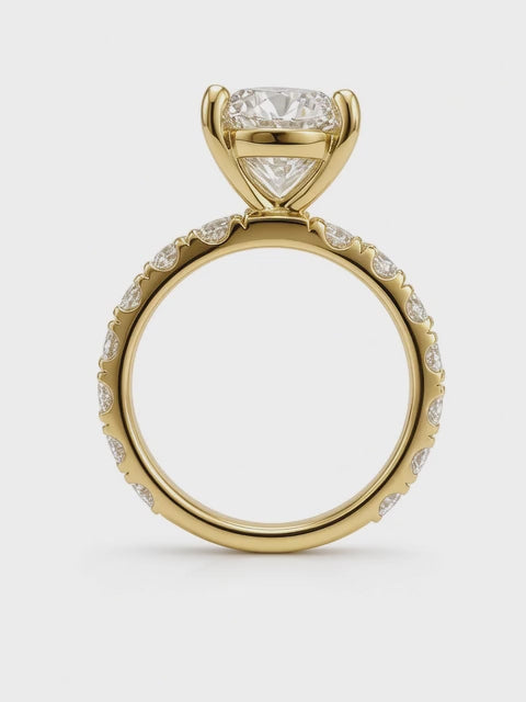 14K Yellow Gold Engagement 2.70CT Round Cut Lab Diamond set in a Four Prong Basket, and 1.55CT on Band