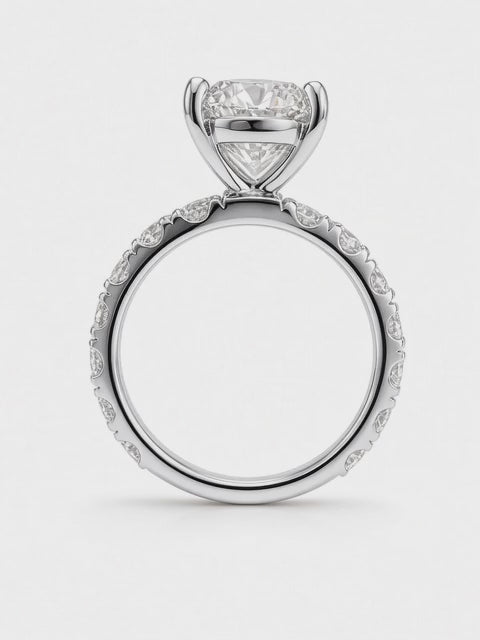 14K Yellow Gold Engagement 2.70CT Round Cut Lab Diamond set in a Four Prong Basket, and 1.55CT on Band